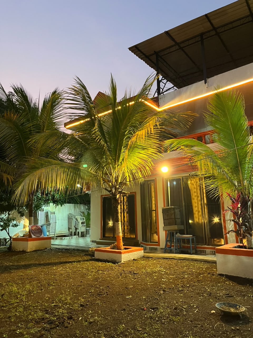 Chill Out Villa courtyard surrounded by palms